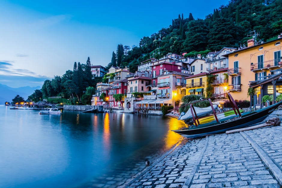 Charming lakeside view of colorful houses in Como, Italy at twilight